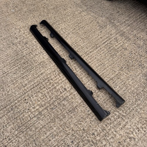 Genuine pair side skirts - side,